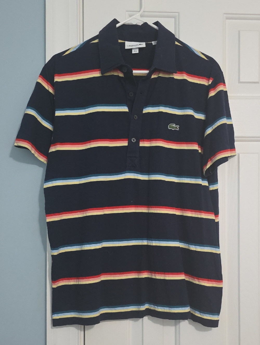 Lacoste Navy Polo with Red, Yellow and Light Blue Stripes